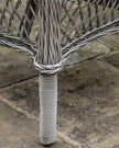 Natural rattan Menton two-seat bistro set by Gallery Direct, featuring woven rattan seats and a round table for garden seating.