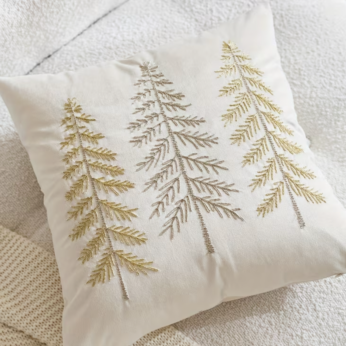 Cream velvet cushion cover with embroidered tree design, neutral decor piece from Starlight Express.