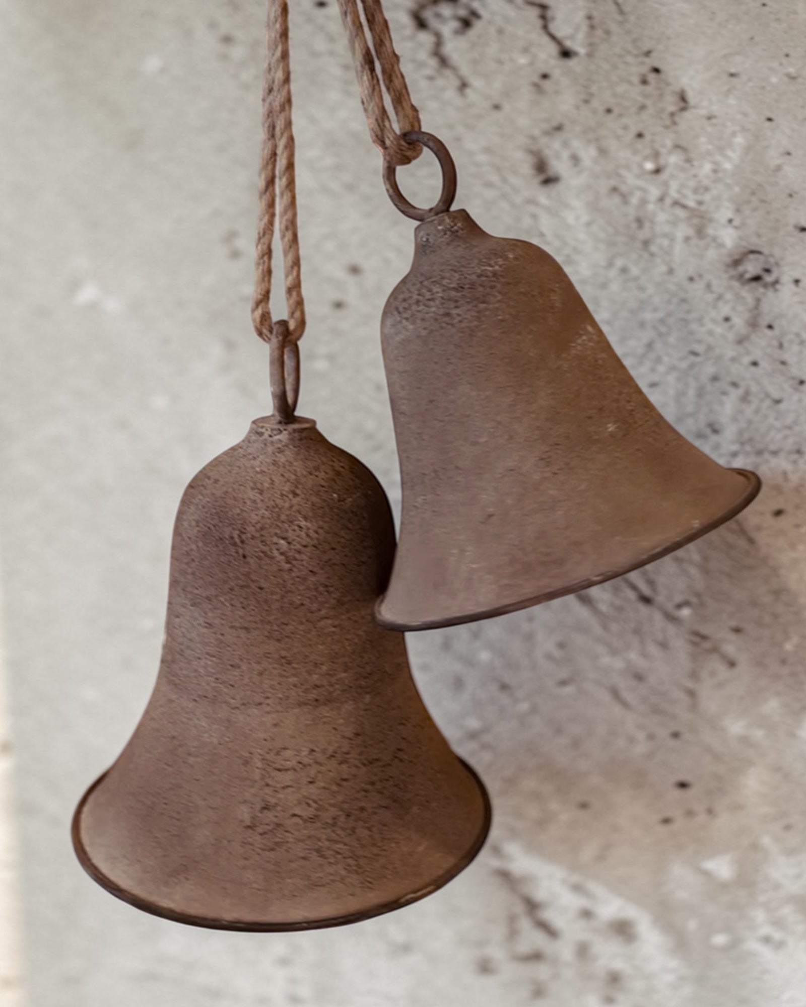 Rustic brass-colored bell from Wikholmform, a charming home décor accent with a vintage-inspired design.