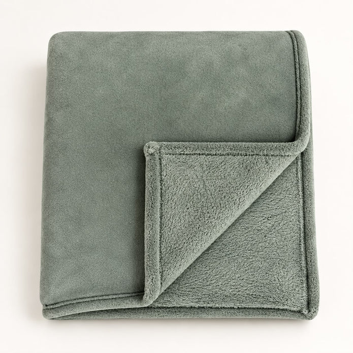 Sage Green Luxury Snuggle Blanket Throw, folded sage green throw with its corner turned back on white