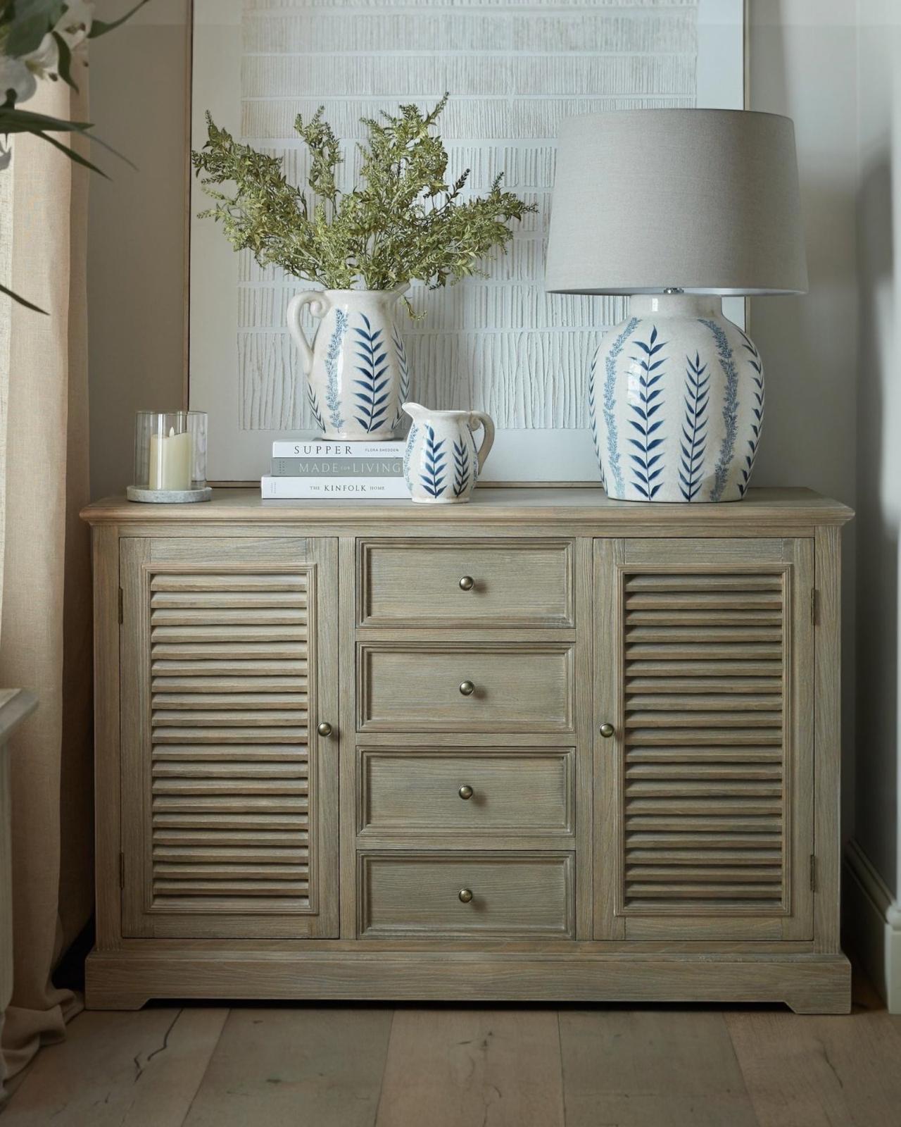 Delphine Collection large dresser base with 2 doors and 4 drawers, Hill Interiors furniture, in a modern bedroom setting