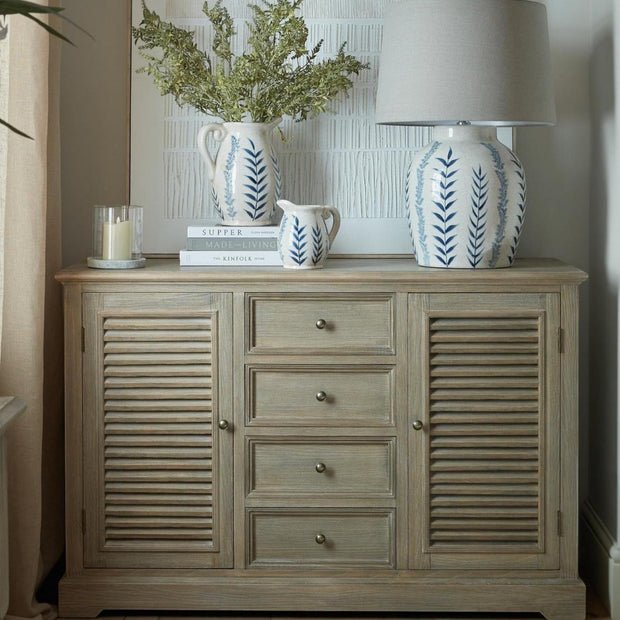 Delphine Collection large dresser base with 2 doors and 4 drawers, Hill Interiors furniture, in a modern bedroom setting