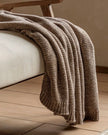 Beige Luxe Chunky Chenille Throw from Gallery Direct, soft and cozy neutral blanket for living room or bedroom decor.