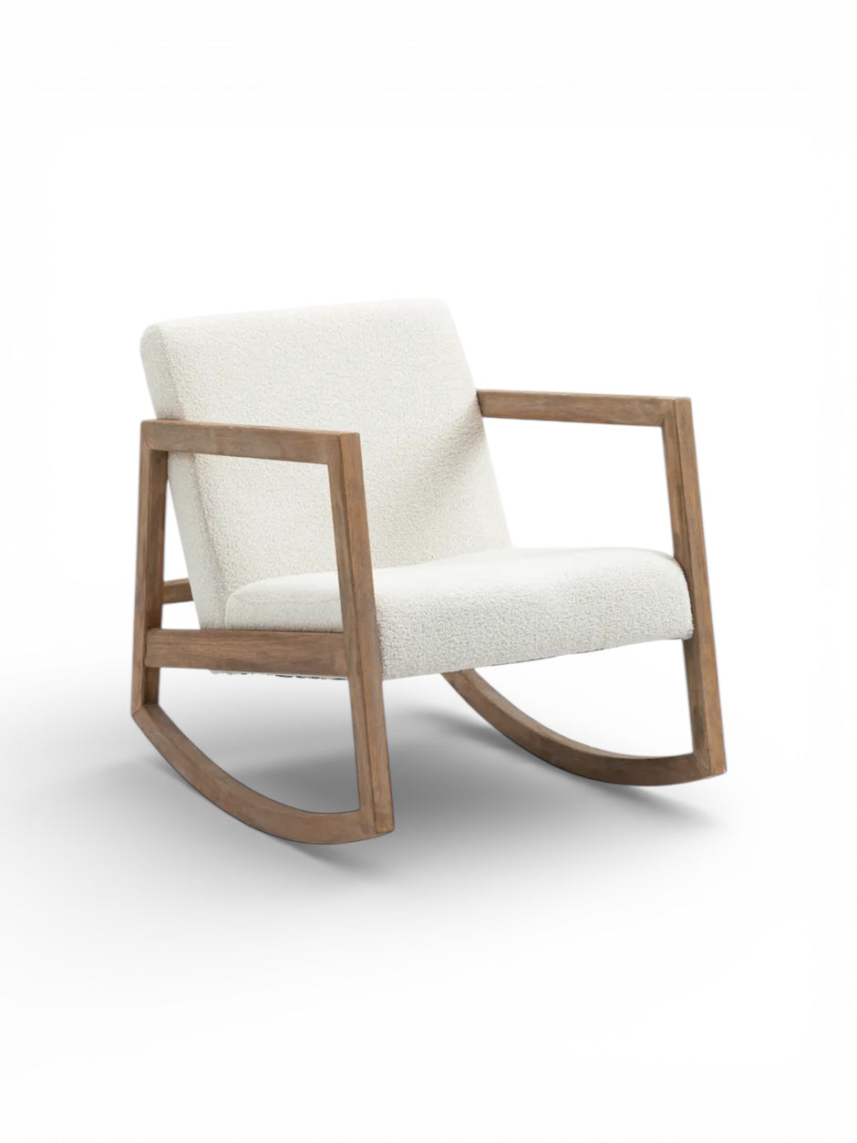 Cream boucle Sherpa rocking chair by Starlight Express with plush fabric and wooden legs, perfect for nursery or bedroom decor.