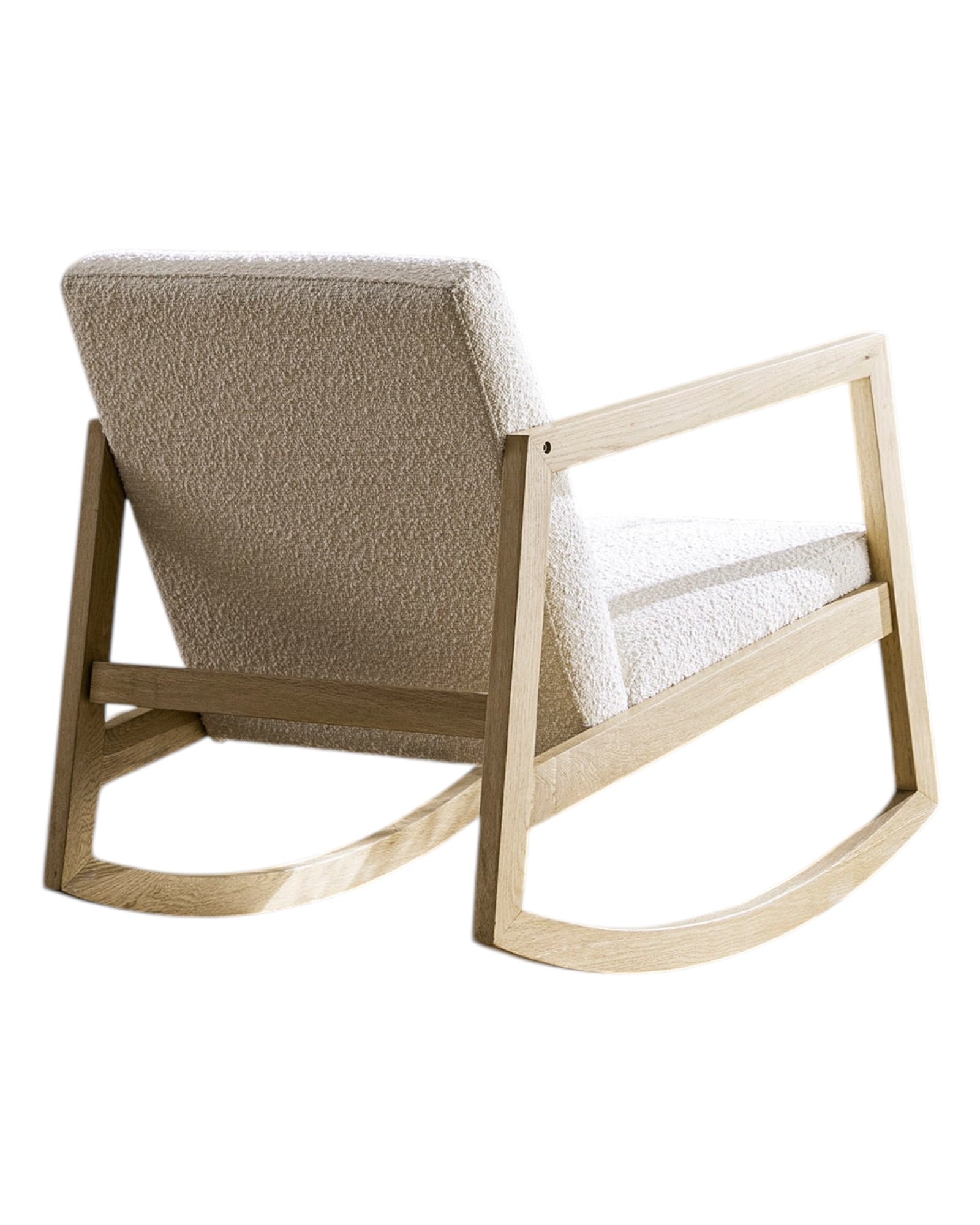 Cream boucle sherpa rocking chair with wooden legs, plush textured upholstery, and a cozy, modern design from Starlight Express.