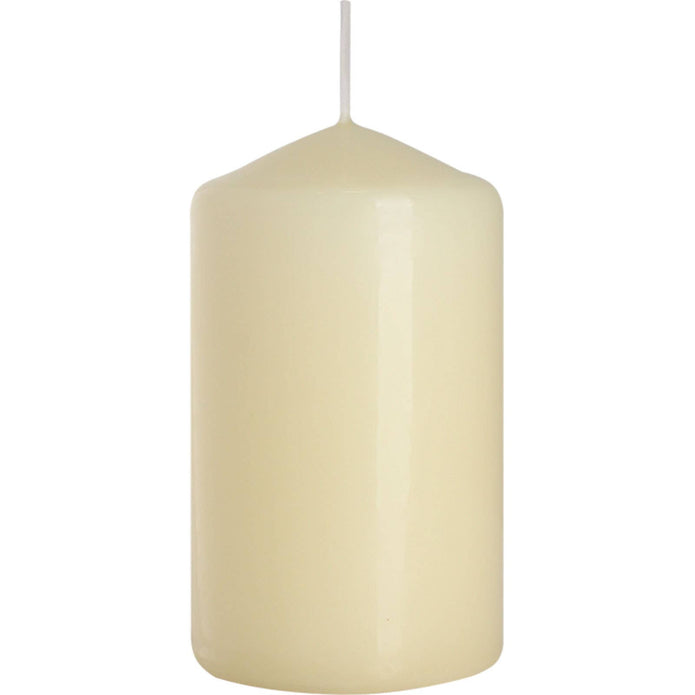 Ivory pillar candle 60x100mm from Ancient Wisdom, featuring a smooth cylindrical shape and warm, inviting glow.