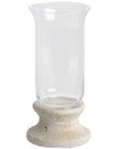 Stone-based hurricane candle lantern for home decor, featuring a glass enclosure and rustic stone base by Hill Interiors.