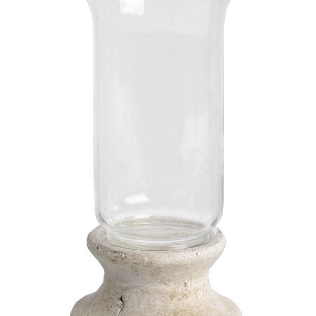 Stone-based hurricane candle lantern for home decor, featuring a glass enclosure and rustic stone base by Hill Interiors.