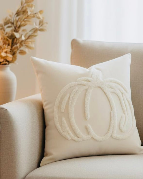 Cream Chenille Pumpkin Cushion Cover, white pumpkin-outline cushion on an armchair