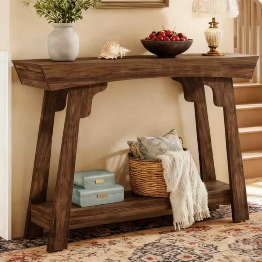 Rustic Natural Medium Gallery Wood Effect Console Table, angled view of the rustic console with books and a throw