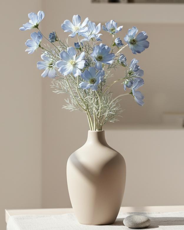 Artificial Ocean Blue Cosmos flower stem from Starlight Express, showcasing vibrant blue petals and green foliage for decorative use.