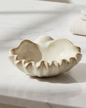 Beige ceramic shell bowl for home décor, featuring a detailed shell design, by Heaven Sends.