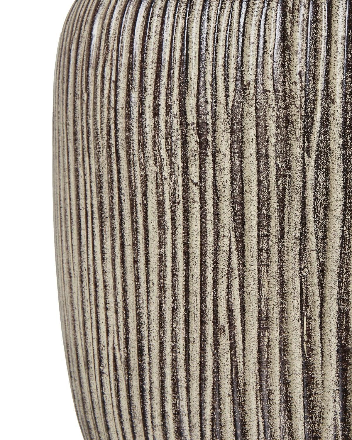 Ochre brown wooden lamp from Hill Interiors, showcasing a stylish lighting fixture with a warm wooden finish and modern design.