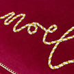 Riva Home red and gold Noel applique velvet Christmas cushion