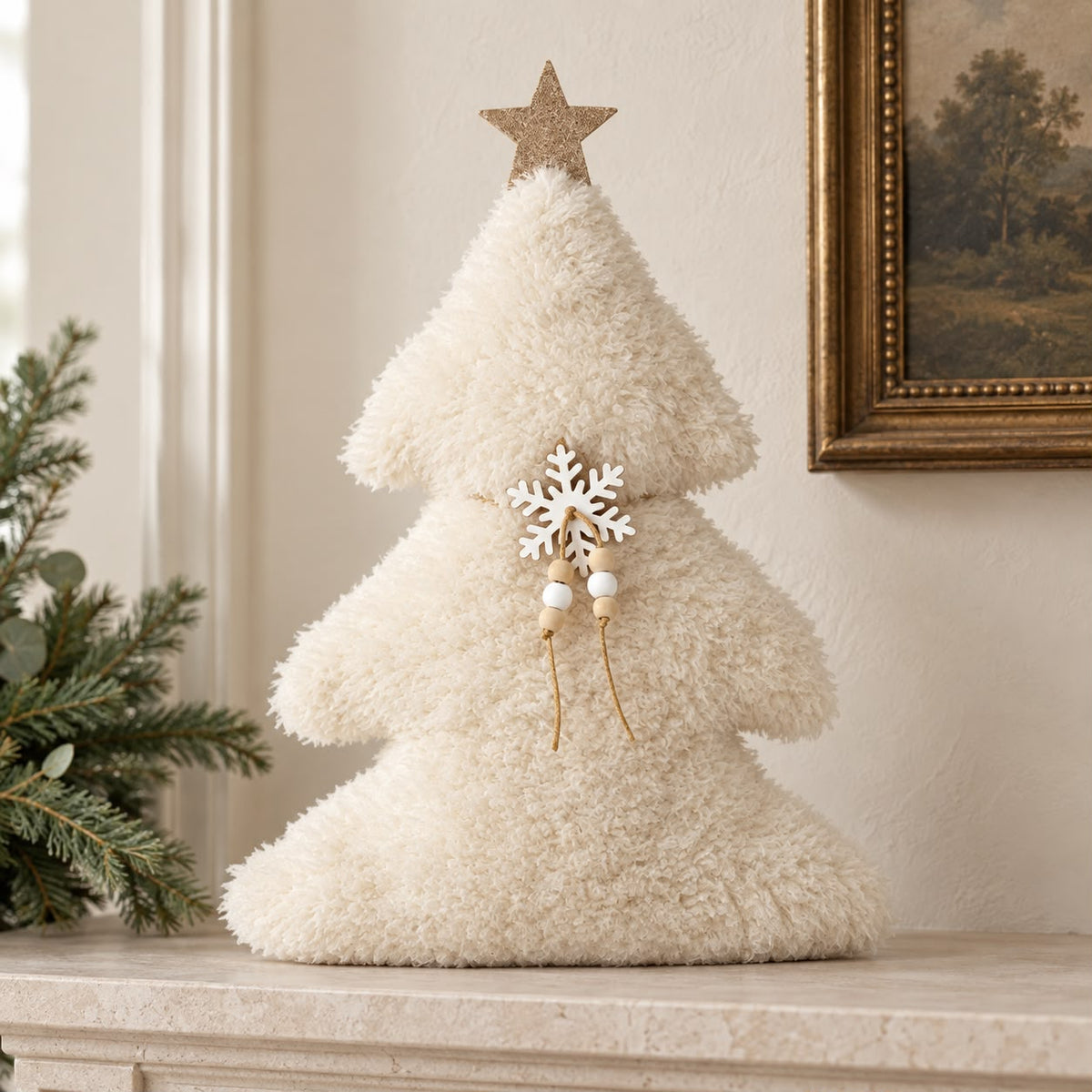 Fluffy Tree With Gold Star, cream fluffy tree with a gold star on a mantel