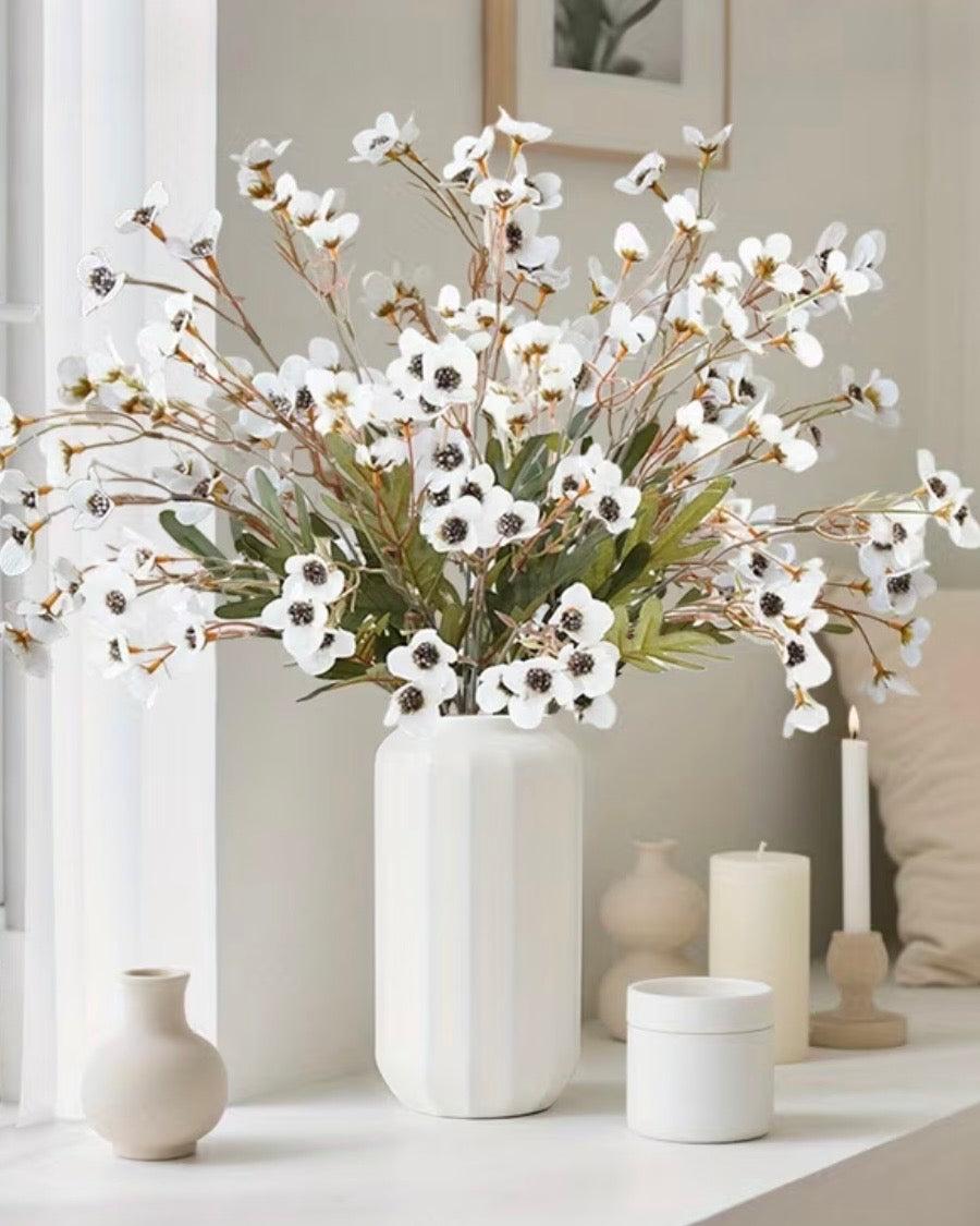 Artificial Daisy Flower Stem in white by Starlight Express, showcasing realistic white daisy flowers on a green stem.