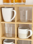 Wooden mug display shelf unit by Starlight Express, kitchen and dining storage rack with multiple hooks and compartments.