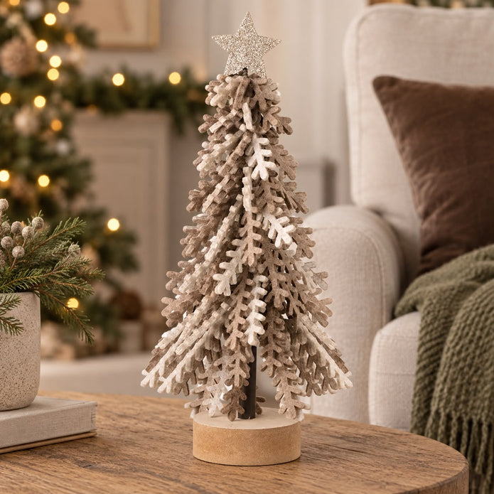 Twisted Brown Leaves Tree With Gold Star, brown and cream layered tree beside a sofa and Christmas tree