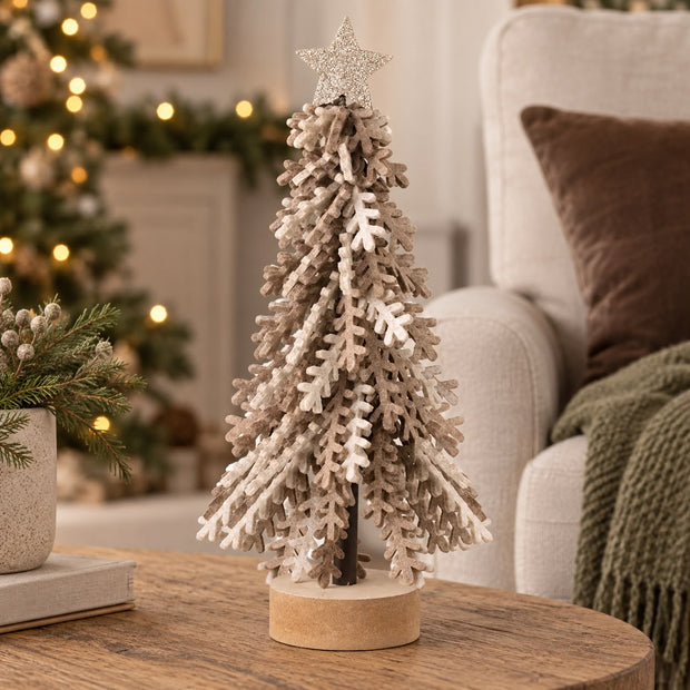Twisted Brown Leaves Tree With Gold Star, brown and cream layered tree beside a sofa and Christmas tree