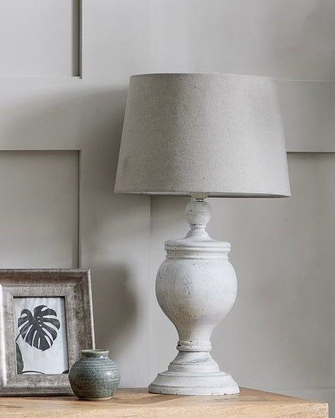 Hill Interiors Uthina Wooden Table Lamp with a sleek, natural wood finish and modern design, perfect for cozy home lighting.