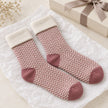 Cosy Cuff Socks - Pink Herringbone, pink and cream herringbone socks beside a wrapped gift