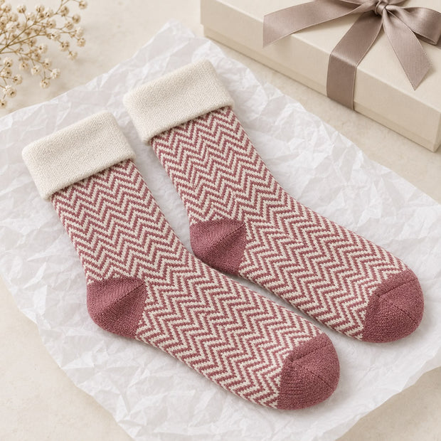 Cosy Cuff Socks - Pink Herringbone, pink and cream herringbone socks beside a wrapped gift