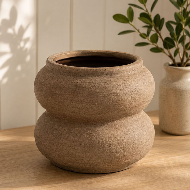 Brown Textured Sculptured Vase, brown sculptural double-rounded vase on a wooden surface