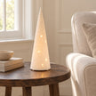 White porcelain Christmas tree lamp by Widdop & Co, featuring detailed holiday-themed design and warm illumination.