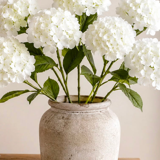 Artificial Tall Soft White Hydrangea Stem, white hydrangea stems arranged in a stone vase