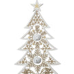 Wooden Tree With White Bells, close-up of the openwork branches and three hanging bells