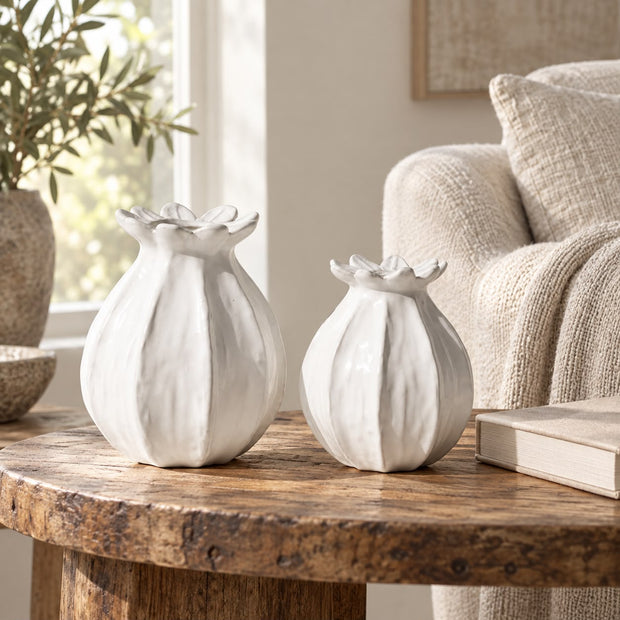 Off-white Lillian Poppy Seed Head Vase by Wikholmform, featuring a sleek, modern design with detailed seed head pattern.