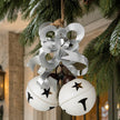 Large Hanging White Bells Garland With Silver Bow, white hanging bells and a silver bow beneath greenery