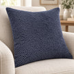 Navy Blue Velvet Bingham Cushion Cover, close-up of the navy textured cushion on a cream seat