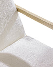 Cream boucle Sherpa rocking chair by Starlight Express featuring plush fabric and wooden rocking base in a cozy, modern design.