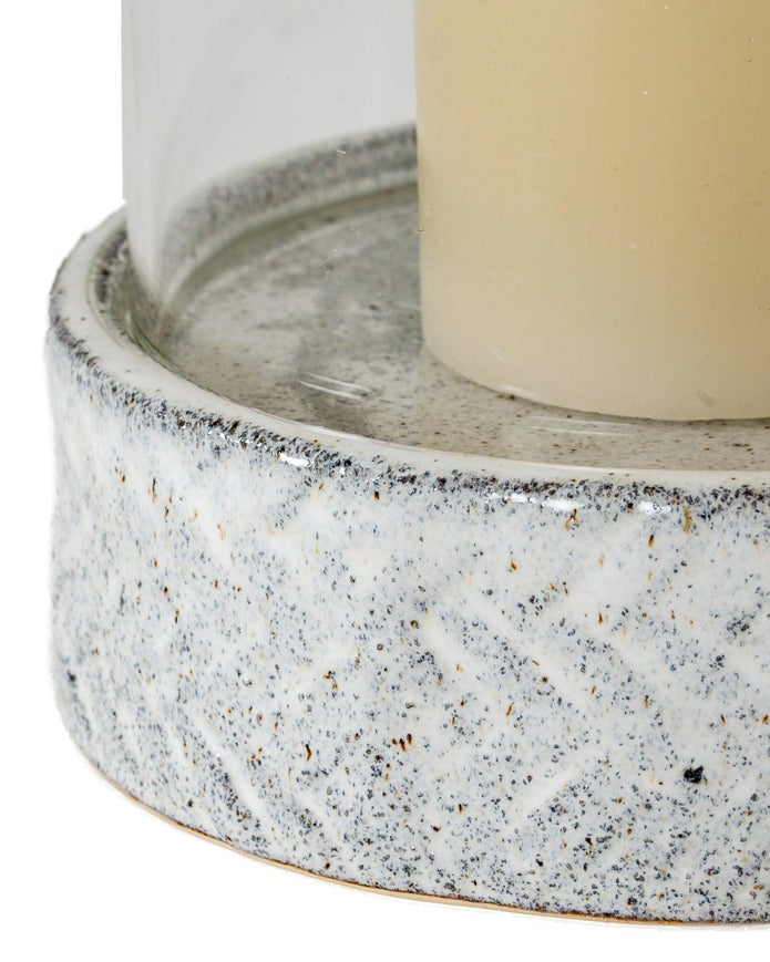 White ceramic hurricane candle lantern for home decor, with a classic design and glass insert, by Hill Interiors.