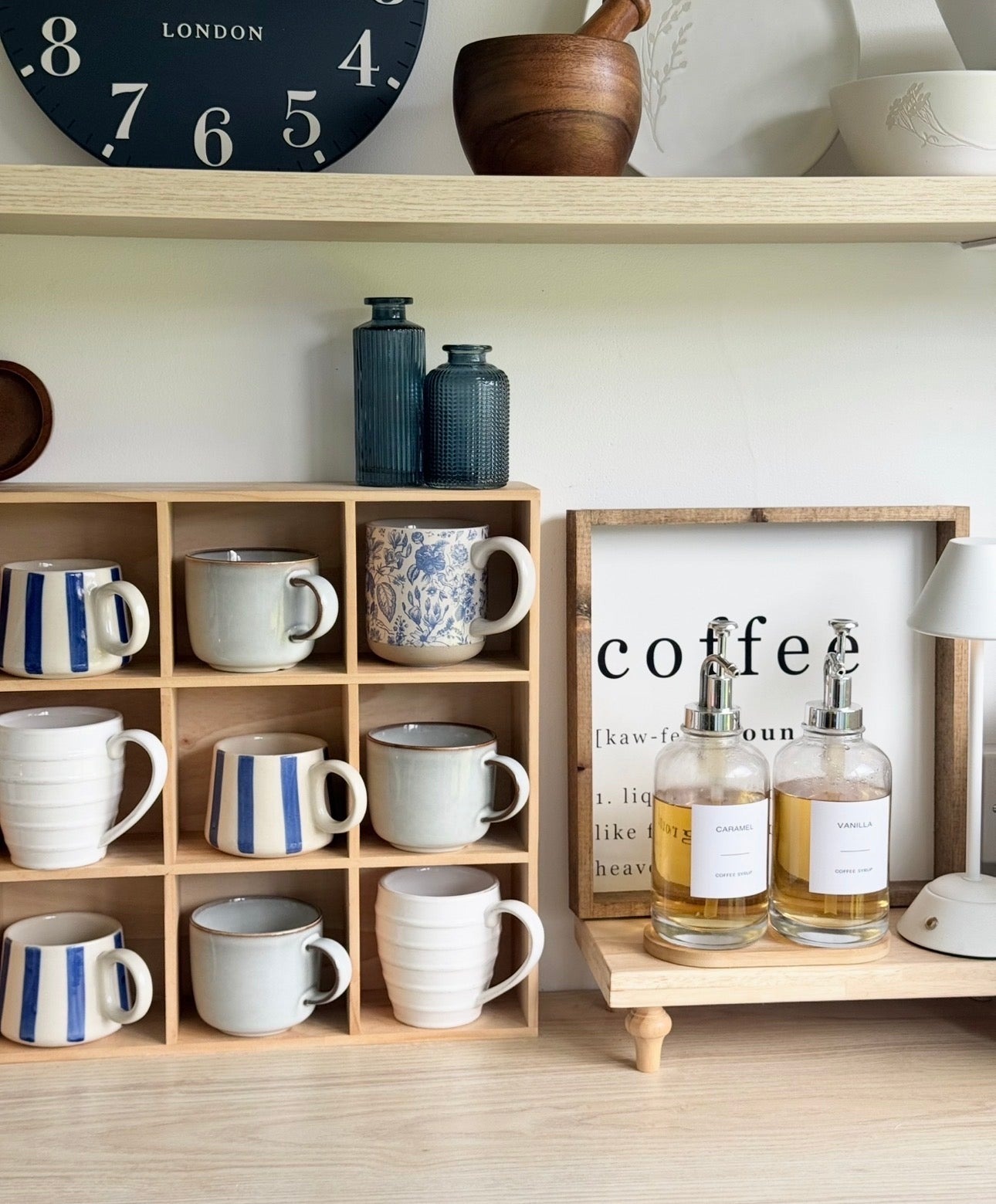 Wooden mug display shelf unit from Starlight Express, ideal for kitchen and dining room organization and decor.