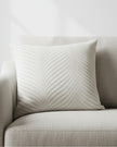 Neutral ivory cut velvet fan cushion cover by Malini, featuring soft, plush fabric with a stylish fan pattern for elegant home decor.
