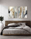 Bedroom with abstract wall art above a bed