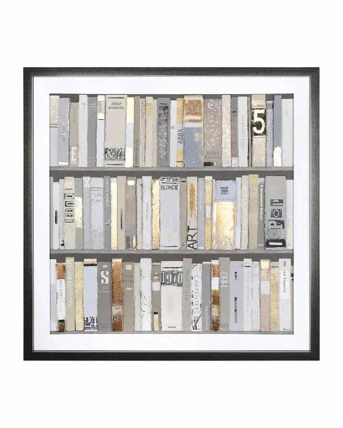Framed artwork of books with a black frame on a white background