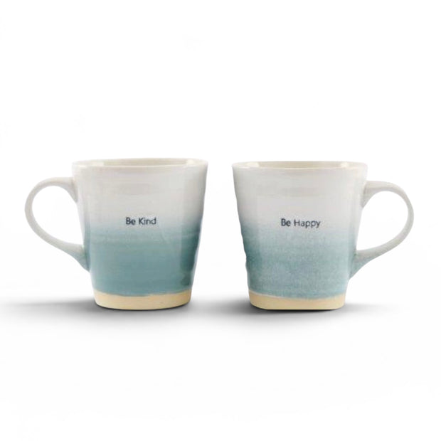 Teal Blue Stoneware Mug, two white and teal mugs with short sentiments against white