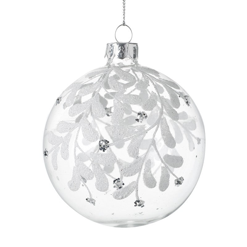 Clear Glass Bauble With White Leaves, clear round bauble with white leaves and a silver cap on white