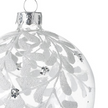 Clear Glass Bauble With White Leaves, close-up of the white leaf pattern and silver cap