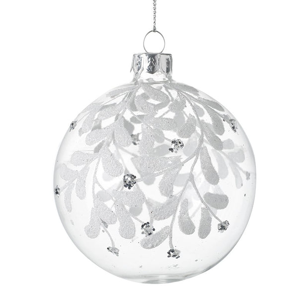 Clear Glass Bauble With White Leaves, clear round bauble with white leaves and a silver cap on white