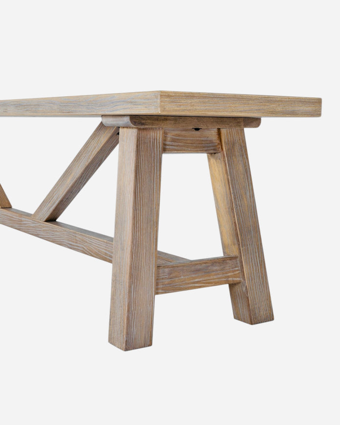 Large wooden dining bench from Hill Interiors' Haldon Collection, showcasing a sturdy, stylish furniture piece for dining rooms.