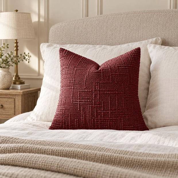 Burgundy Chenille Textured Cushion Cover, burgundy textured cushion against white pillows on a bed
