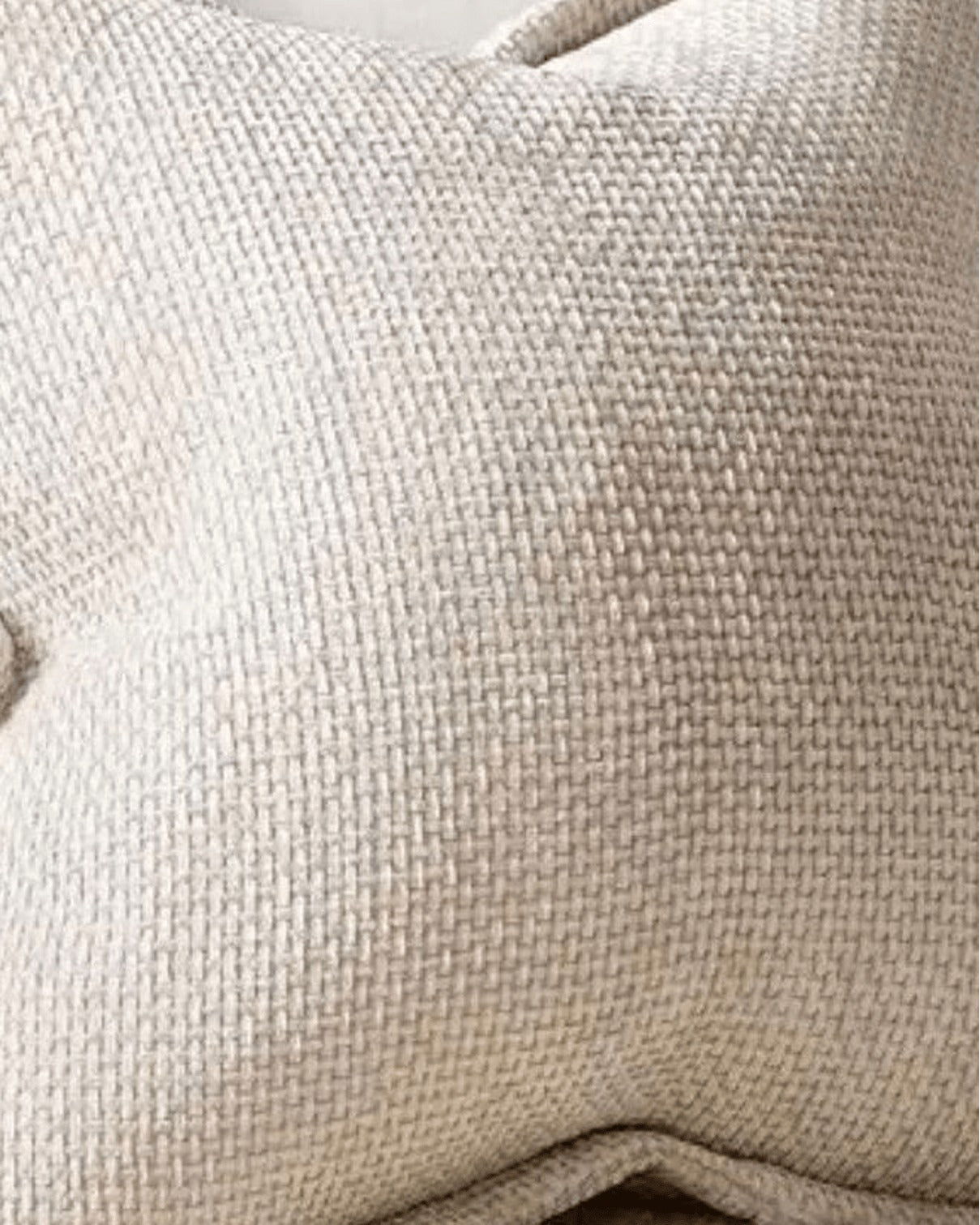 Cream woven design cushion cover from Starlight Express featuring soft woven fabric with intricate textured pattern.