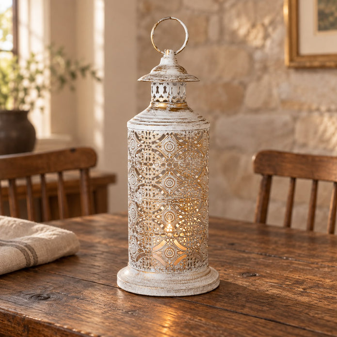 Tall white metal cut out lantern, decorative gift item with intricate design, perfect for home decor or special occasions.