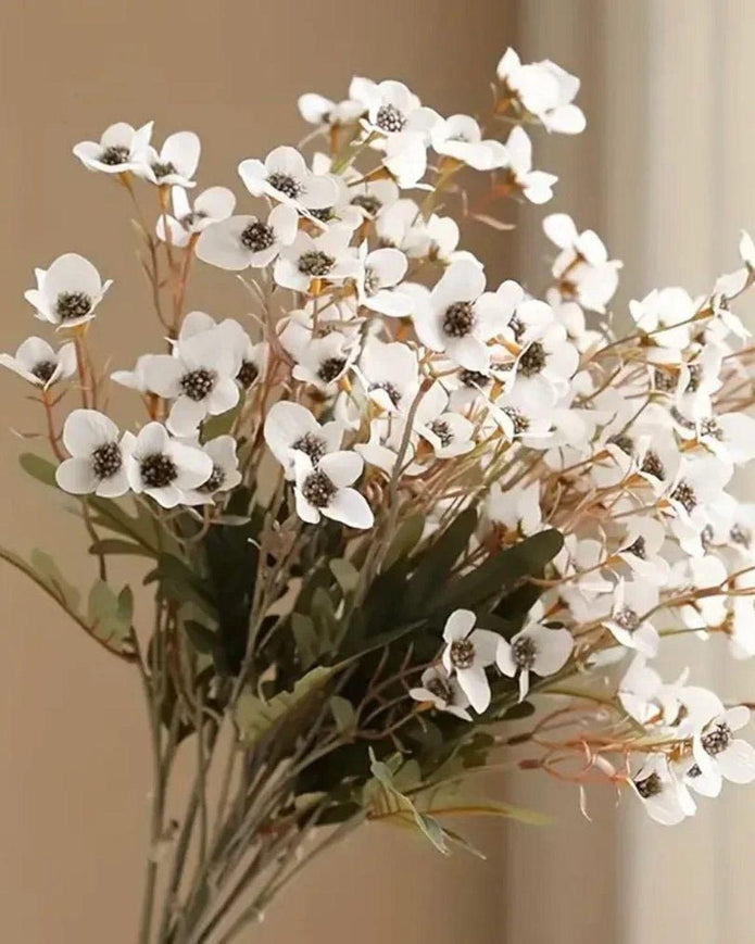 Artificial Daisy Flower Stem in white by Starlight Express, showcasing realistic white daisy blooms on a green stem.