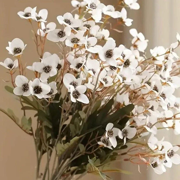 Artificial Daisy Flower Stem in white by Starlight Express, showcasing realistic white daisy blooms on a green stem.