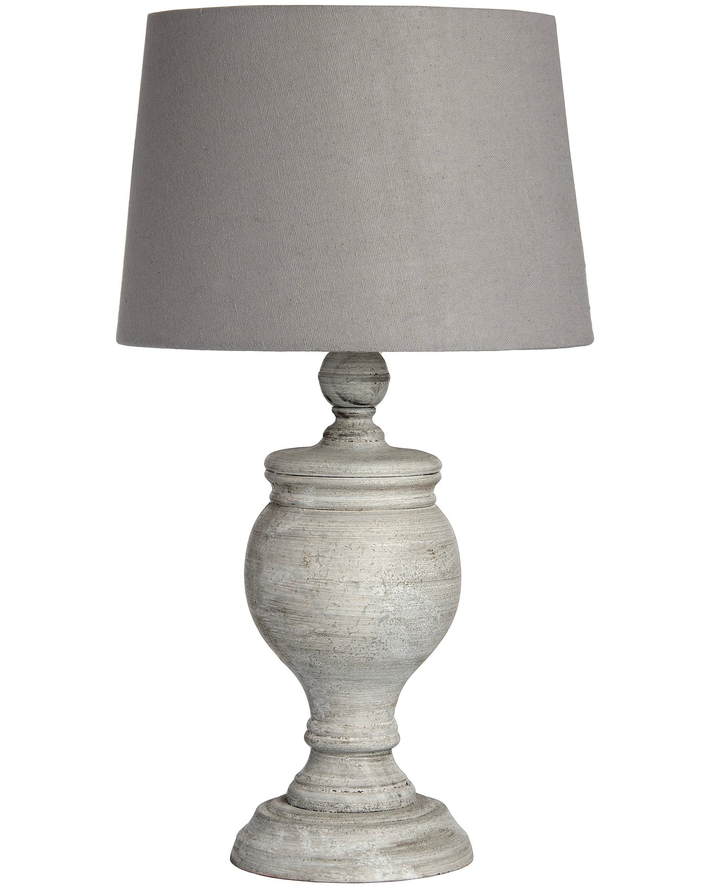 Uthina wooden table lamp by Hill Interiors featuring a sleek, natural wood finish and modern lighting design on a table surface.